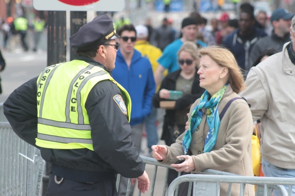 Boston Police answered questions as they moved crowds away from the scene.