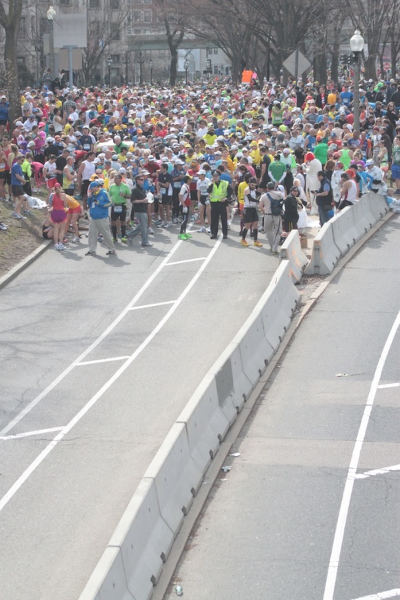 Hundreds of runners were stopped on Commonwealth Avenue, just short of the Massachusetts Avenue bridge.