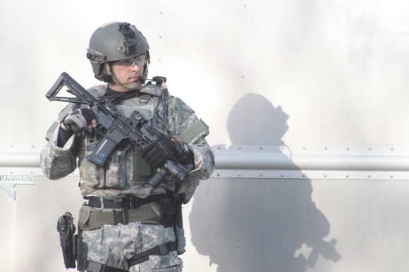 A member of the Metro SWAT team on Charles Street between Boston Common and Boston Gardens.